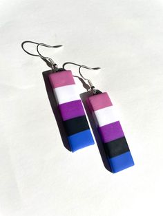 These earrings are made from premium polymer clay. They are super lightweight. Genderfluid Earrings, Genderfluid Flag, Flag Earrings, Skeleton Earrings, Month Gifts, Rainbow Heart, Clay Ideas, Cute Packaging, How To Make Earrings