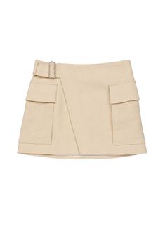 The Conan Skirt is crafted from our structured spring tweed fabric in a pale beige hue. Inspired by timeless safari style, this mini wrap silhouette features large flap pockets and a belted waist. Shop Bottoms Styling Tip: Style with a tee and loafers for effortless daytime polish. Barely Beige, Beige Clothes, Fringe Mini Skirt, Linen Mini Skirt, Peter Som, Crossover Dress, Pale Beige, Cargo Vest, Beige Skirt