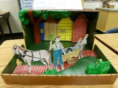 a paper model of a man and horse pulling a wagon with two people in it