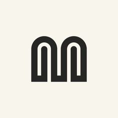 the letter m is made up of two black letters, one with an o on it