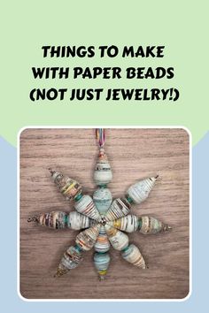 an ornament made out of paper beads with the words things to make with paper beads not just jewelry