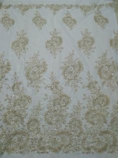 "This stunning Lace Fabric design piece has soft hand feel, It's perfect for weddings, bridal parties, and any events. Shop our large inventory of bridal fabrics. ☆PRODUCT DESCRIPTION : This gorgeous fabric is made on a sheer base with a beautiful vintage embroidery and delicate beaded throughout. The fabric width is approximately 51\" (130cm) Wide. Color: light champagne as in picture Material: Rayon, Polyester，Sequins, Pearls ☆ PURCHASING INFORMATION: This fabric is sold by the yard and each Q Elegant Embroidered Sequin Fabric For Wedding, Elegant Cream Embroidered Fabric With Sequins, Elegant Cream Sequin Fabric With Pearl Embroidery, Gold Sequin Fabric With Pearl Embroidery For Wedding, Glamorous Sequin Fabric With Intricate Embroidery For Wedding, Glamorous Embroidered Sequin Fabric For Wedding, Elegant Rhinestone Embroidered Fabric For Weddings, Elegant Embroidered Fabric With Rhinestones For Wedding, Glamorous Gold Embroidered Fabric For Wedding