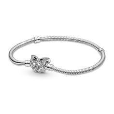 From Pandora, tell your spring story and be inspired by the season of transformation with this sterling silver Butterfly Clasp Snake Chain Bracelet. Cut-out and raised heart details and sparkling bead-set round brilliant-cut clear cubic zirconia give depth and dimension to the butterfly's wings. Style up to 18 charms on the bracelet and carry spring moments with you wherever you go. Pair it with other sterling silver pieces, like Pandora's Blue Butterfly Hoop earrings. This bracelet measures 6.3 Pandora Blue, Pandora Bracelet Designs, Snake Chain Bracelets, Pandora Style, Pandora Bracelets, Pandora Bracelet, Pandora Jewelry, Silver Pieces, Snake Chain