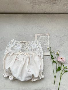 Spring bloomer shorts with floral print Cute Summer Bloomers, Cute Spring Bloomers, Cute Bloomers For Playwear, Spring Season, Spring Floral Print Cotton Bloomers, Cute Cotton Bloomers For Playtime, Bloomer Shorts, Bloomers Shorts, Cream Flowers, Embroidery Flowers