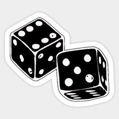 two black and white dice stickers sitting on top of each other