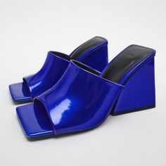 Nwt Metallic Blue Geometric Block Heel Square Toe Mule Sandal, 8 Brand New Zara Block Heel Slides In Blue, 8 Block Heel (~3.7in/9.3cm Heel Height) Slides W/ Square Toe & Shiny Metallic Effect Increased Comfort W/ Airfit Flexible Technical Sole 100% Polyurethane W/ 100% Polyester Lining, 100% Polyurethane Thermoplastic Sole & Mixture Of Sheep Leather (70%) & Polyurethane (30%) Insole Thanks For Looking!!! Blue Mules For Summer Evenings, Blue Sandals For Spring Party, Blue Sandals For Party In Spring, Elegant Blue Mules For Spring, Blue Pointed Toe Sandals For Night Out, Blue Open Toe Sandals For Party, Blue Open Toe Party Mules, Modern Blue Mules For Summer, Trendy Blue Open Toe Mules