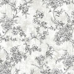 a white and gray floral wallpaper with flowers on the side, in an old - fashioned