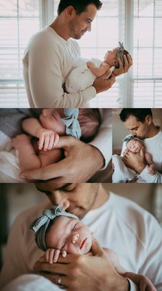 a man holding a baby in his arms