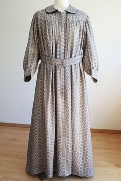 **Please enter your phone number in the 'personalisation' box. This is required by delivery services in case there is a problem with your delivery. Antique dress from the 1890s-1900s. Grey with black floral pattern, smooth cotton fabric. Medium-weight cotton bodice on the inside. No fasteners on the outside, it is a wrap-style dress fastened with a built-in belt. Still has the original basting threads needed for construction, but it is adorable so we left it as is. (The basting threads are not n Calico Dress, Black Floral Pattern, Antique Dress, Prairie Dress, Country Primitive, Day Dress, Black Floral, Floral Pattern, Bodice