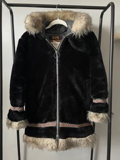 Zipper needs to be replaced, does not pull well and gets stuck. Otherwise, good condition. Hooded Fur Coat With Zipper For Winter, Vintage Hooded Fur Coat For Fall, Vintage Hooded Outerwear With Zipper Closure, Winter Hooded Fur Coat With Zipper Closure, Cozy Black Outerwear With Faux Fur Trim, Western Goth Coats & Jackets, Fur Hooded Jacket, Vintage Faux Fur Outerwear With Trim, Vintage Brown Outerwear With Faux Fur Trim