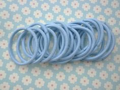 You will receive 20pc black Hair elastics,skinny elastic color:blue quantity:20pcs diameter:4mm If you need more,please let me know. Blue Hair Tie, Blue Ponytail, Black Hair Elastics, Light Blue Hair, Silky Pajamas, One Hair, Hair Elastics, Fabric Ribbon, Ponytail Holders