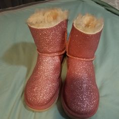 Pink Glittery Ugg Bailey Bow Boots. Size 6, Only Worn A Few Times & Still Look Brand New. These Would Make A Really Nice Christmas Gift For The Holidays Winter Boots With Glitter Accents And Round Toe, Casual Glitter Boots With Round Toe, Casual Glitter Boots For Party, Casual Glitter Party Boots, Winter Glitter Print Boots With Round Toe, Winter Boots With Glitter Print And Round Toe, Pink Glitter Accents Round Toe Boots, Pink Glitter Accented Round Toe Boots, Ugg Bailey Bow