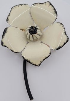 Western antique 3- Dimensional white enamel flower jewelry pin. This is made of alloy, enamel and measures 2 3/4 inches x 2 inches. In very good well-kept condition. We don't not see any cracking. Thank you for shopping with our small business Vintage White Flower Brooches, White Vintage Flower Brooches, Vintage White Enamel Pin, White Vintage Enamel Pin, Vintage White Flower Brooch, Vintage White Flower Enamel Pin, White Enamel Flower Brooches, White Flower-shaped Enamel Brooches, White Flower Enamel Brooches