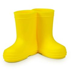 two yellow rain boots are shown on a white background