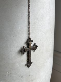 Exquisite large rosary cross pendant aged to perfection with the most beautiful patina. Metal is light, and discolored from age and air. Chain included, very long and perfect for layering, all brass and silver tone metal with patina.  Good antique condition, distressing and imperfections are visible on purpose.  All sales final. Bronze Cross Bohemian Necklace, Bronze Bohemian Cross Necklace, Bohemian Bronze Cross Necklace, Bronze Brass Cross Necklace, Antique Brass Cross Pendant Necklace, Vintage Crucifix Cross Necklace As Gift, Vintage Crucifix Cross Necklace Gift, Antique Bronze Cross Necklace, Bronze Crucifix Necklace For Spiritual Purposes