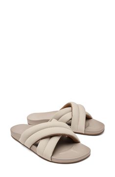 Thick, padded straps soften the look of this beach-ready sandal crafted with an arch-supporting anatomical midsole footbed and a grippy, nonmarking sole. Flat sole Water-resistant Cushioned footbed with arch support Synthetic upper and lining/rubber sole Imported Beige Cushioned Slide Flip Flops, Beach Sport Sandals With Removable Insole In Beige, Beige Sport Sandals With Removable Insole For Beach, Beige Synthetic Sport Sandals For Beach, Beige Cushioned Flat Flip Flops, Beige Cushioned Flip Flops, Beige Cushioned Sport Sandals For Beach, Beige Sport Sandals With Cushioned Footbed For Beach, Beige Slide Sandals With Cushioned Footbed