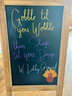 a chalk board with writing on it that says gobble til you wobble then shop till you drop w jelly grace