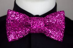 Fully covered hot pink glitter encrusted bow tie, These bow ties are made from a heavy duty fabric packed FULL with glitter!!  Each bow tie is handmade by me using the best high quality materials, they are extremely sturdy and will never lose their shape, all designs come with a black satin adjustable neck strap that will fit any neck size. Customisations are available for all of my designs, please get in contact if you would like me to create a custom order for you. All parcels shipped outside Purple Bow Tie For Party, Purple Party Bow Tie, Pink Satin Bow Tie For Party, Party Bow Ties, Hot Pink Bow Tie, Hot Pink Glitter, Leather Bow Tie, Pink Bow Tie, Satin Noir