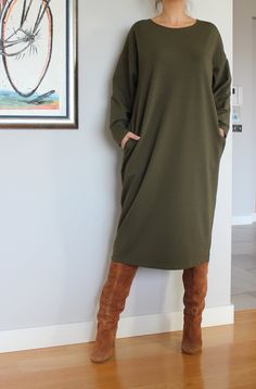 "Olive Green Sweater Dress, Plus Size Clothing, Loungewear Dress, Jumper Dress, Long Sleeve Dress, Pocket Dress, Plus Size Dress,Caftan Dress Lovely, comfy, stylish Jumper Dress - perfect for daywear or loungewear. Super easy to wear and easy to care. At Cherry Blossoms we aspire to make clothing that brings chic style to any size figure with comfortable fabrics, meticulous tailoring and original, beautiful designs! 🍒 A very good choice for the Fall/Winter/Spring Seasons :) Accessorize your dre Khaki V-neck Dress With Pockets, Oversized Green Dress For Fall, Oversized Tunic Dress For Work, Oversized Green Tunic Dress, Olive Long Sleeve Midi Dress, Green Long Sleeve Tunic For Daywear, Green Oversized Dress For Workwear, Green Oversized Dress For Work, Oversized Green Dress For Work