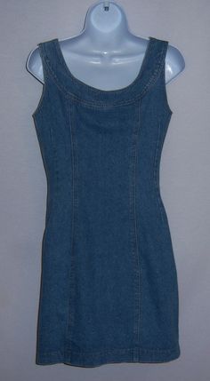 "Vintage DKNY New York blue denim jean fitted dress. Good pre-owned condition. No holes, stains, rip, tears, fading, etc. Women's size 8 or SMALL. Measurements: bust-38\", waist-28\", hips-36\", length-33\". 100% cotton. Button front. Fantastic early 90's DKNY!" Stretch Cotton Denim Dress In Dark Wash, Stretch Cotton Denim Dress In Medium Wash, Fitted Denim Y2k Dress For Summer, Fitted Y2k Denim Summer Dress, Y2k Style Mini Denim Dress, Vintage Fitted Medium Wash Dresses, Fitted Denim Blue Denim Dress, Fitted Denim Blue Cotton Dress, Fitted Denim Blue Dress