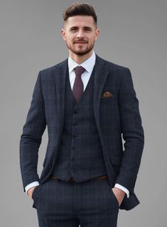 Sustain a stylish and trendy allure with our Italian Atessia Check Tweed Jacket. Meticulously crafted from a sumptuous wool blend, it boasts deep blue hue with a subtle hint of red plaid radiating confidence and refinement. Tailored for the discerning gentleman who prioritizes both style and comfort. Whether you're attending a business meeting or enjoying a weekend getaway, this suit is designed to deliver a polished and refined look without compromising.  Look features a 2 button jacket with no Black Check Suit, Blue Plaid Suit, Blue Tweed Jacket, Grey Tweed Suit, Tweed Suit, Check Suit, Mens Casual Dress Outfits, Beautiful Suit, Plaid Suit