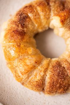 a close up of a doughnut on a plate