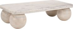 a white marble bench sitting on top of a wooden table