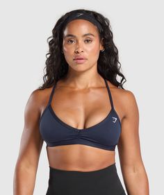 Gymshark Minimal Sports Bra - Heavy Blue Gymshark Minimal, Gymshark Bra, Fitted Blue Sports Bra With Built-in Bra, Sports Bras Gymshark, Gymshark Sports Bra Black, Blue Compressive Sports Bra, Gym Jacket, Minimiser Bra, Women's Workout