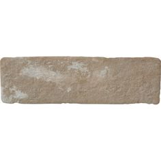 a stone block with white paint on it