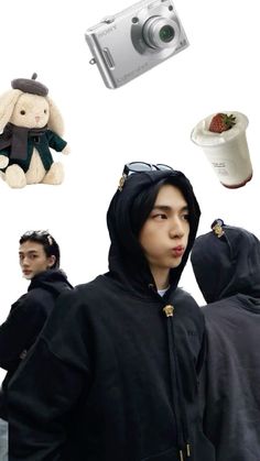 a person wearing a hoodie and some stuffed animals