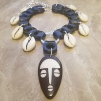 This+gorgeous+necklace+is+made+with+upcycled+vegan+leather,+natural+cowrie+shells,+and+batik+bone+pendant+focal. Queen Jewelry, Big Jewelry, Bone Pendant, African Necklace, Leather Chokers, Mens Beaded Bracelets, Clay Jewelry Diy, African Jewelry, Shell Jewelry