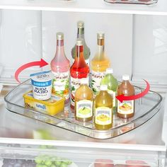 an open refrigerator filled with different types of drinks