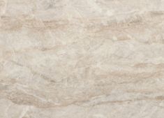 a white marble textured surface with light brown veiners and dark gray streaks on the edges