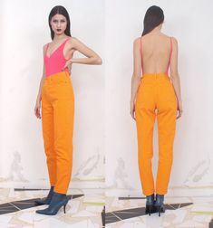 "vintage 90s bright orange high waist jeans> five pockets label> h&j \\ holiday&jeans material> cotton size> 46\\32 waist> 74cm\\ 29'' hips> 102cm\\ 40'' length> 103cm\\ 40'' inseam> 28cm\\ 11\" condition> great vintage condition> minimal wear | model is 174 cm [5'8\"] and measures 80-56-90 cm [31\"-22\"-35\"] |" Orange Straight Leg Summer Bottoms, Orange Straight Leg Bottoms For Summer, Orange Straight Leg Jeans For Spring, Retro Orange Bottoms For Spring, Vintage Orange Bottoms For Spring, Vintage Orange Pants For Spring, Orange Jeans For Spring, Spring Orange Jeans With Pockets, Retro High Waist Orange Pants