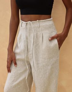 The tie front wide leg pants offer a relaxed fit with an adjustable waist for effortless style. Handcrafted in our studio to your measurements and preferences, available in over 60 colors. STYLE DETAILS - 100 % linen, medium weight (200gsm), free-shrinkage, amazingly soft feel - Floor length pants; different length is possible - High waisted - Wide-legs - Front zipper with detachable ties - Inseam pockets - Pants inseam 29''/74cm and pants outseam 40.5''/103cm/size S for our lovely model 5ft5/16 Casual Linen Pants With Tie Waist, Relaxed Fit Linen Wide Leg Pants With Tie Waist, Relaxed Fit Wide Leg Pants With Tie Waist, Relaxed Fit High-waisted Pants With Tie Waist, Relaxed Fit High Waist Bottoms With Tie Waist, High-waisted Relaxed Fit Pants With Tie Waist, Wide Leg Linen Pants With Tie Waist, High-waisted Pants With Tie Waist And Relaxed Fit, Relaxed Fit Linen Bottoms With Tie Waist