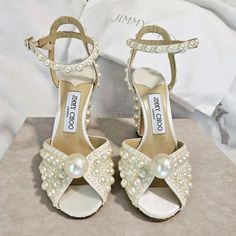 Jimmy Choo Bridal Pearl Sacaria Shoe Size 6/ Eu36. New With Box And 2 Shoe Bags. Luxury White High Heel Wedding Shoes, Luxury White Heels For Wedding, White Luxury Almond Toe Wedding Shoes, Luxury White Almond Toe Wedding Shoes, Luxury White Wedding Shoes, Designer High Heel White Wedding Shoes, Designer White High Heel Wedding Shoes, Luxury Cream Open Toe Wedding Shoes, Designer White Round Toe Wedding Shoes