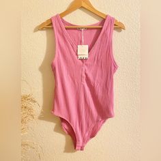 Brand: Zara Size: Women’s Xl Brand New With Tags, Never Worn Pink Ribbed Bodysuit By Zara! So Cute And Fun! Has Functional Snaps On The Front And At Lower Area. Perfect Condition! Bubblegum Barbie Pink Color In Person. Pet Free, Smoke Free Home Same Day Shipping, Or By Next Morning Bodysuit Zara Nwt Cute Bodysuit Snatched Ribbed Bubblegum Pink Pink Tank Womens Bodysuit Fitted Zara Pink Tank Top, Zara Sleeveless Lined Bodysuit, Zara Stretch One-piece Bodysuit, Barbie Pink Color, Zara V-neck Summer Bodysuit, Chic Zara V-neck Bodysuit, Pink Ribbed, Ribbed Knit Bodysuit, Knit Bodysuit