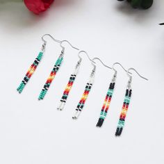 Beaded Earrings,Local Beaded Earrings Make your day more colorful with some of my items. Each one of them is handmade with a lot of love and positive energy. These unique earrings are the perfect addition to any look. A gift for you or a loved one, a gift for anniversary and birthday. Customize the earring color by selecting a color from the drop down menu. Depending on where you are viewing the item on a mobile device or monitor, colors may have a slight discrepancy. If you have any questions or ideas, don't hesitate to ask. Thank you for visiting my store! For more great jewelry you can visit this link  https://www.etsy.com/shop/NataliaArttCo?ref=seller-platform-mcnav Simple Bead Earrings, Earrings Western, Beadwork Designs, Gift For Anniversary, Western Earrings, Beaded Jewlery, Beaded Tassel Earrings, Diy Bracelets Patterns, Beaded Earrings Patterns