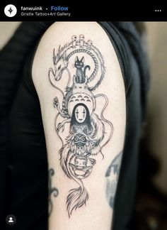 a woman with a tattoo on her arm