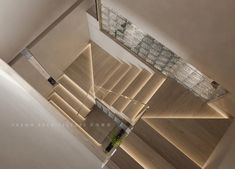 the interior of a modern house with wood and stone accents on the walls, flooring and ceiling