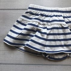 NEW Tea Collection Navy White Striped Skort - Sweet Pea & Teddy Cotton Bloomers With Elastic Waistband For Playwear, Summer Short Diaper Cover With Elastic Waistband, Elastic Waistband Short Diaper Cover For Summer, White Cotton Bloomers With Elastic Waistband, Casual Cotton Diaper Cover With Elastic Waistband, Summer Playful Diaper Cover With Elastic Waistband, Playful Summer Diaper Cover With Elastic Waistband, Cotton Bottoms With Ruffles For Playtime, Summer Cotton Skirt For Playtime