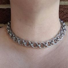 "Helm is an incredibly versatile chainmaille weave. It's one of my most popular styles for both men and women. This necklace is just the right amount of chunky and has a wonderful weight to it making it a delight to wear. It looks great as either a short choker, or as a longer neck chain. Check out the matching bracelet... https://www.etsy.com/listing/737839755/chunky-helm-weave-chainmaille-bracelet Or my other Helm Weave items here! https://www.etsy.com/shop/ZenJumpsChainmaille?ref=simple-shop- Chainmaille Bracelet Weave Got Maille, Chainmaille Bracelet Rocks N Chains, Chainmaille Jewelry Rocks N Chains, Cheap Chain Jewelry For Festivals, Homemade Chain Necklaces, Luxury Metal Chainmail Jewelry, Chainmail Ring Patterns, Chainmail Patterns Necklaces, Chainmail Jewelry Set