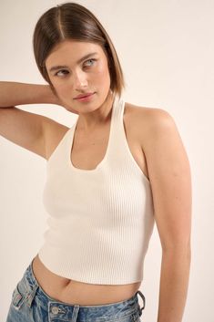 Ribbed knit halter top. Scoop neckline. Halter neck strap. Low back. Sleeveless. Cropped length. Fitted silhouette. Shaper Fit styles feature premium stretch fabric and contour fit designed to sculpt the body. 73% Viscose, 27% Nylon. Imported. Designed in LA. Model wears size S. Open Back Tank Top, Open Back Tank, Fitted Silhouette, Neck Strap, Low Back, Halter Neck, Scoop Neckline, Halter Top, Fitness Fashion