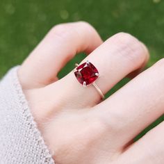 -------------------------------------------------------- Lab Ruby Ring - PLEASE NOTE: ALL RINGS WILL BE SIZED UP A BY A QUARTER DUE TO THE STONE'S FACETED POINT ON THE BOTTOM. THE PRODUCT - This is a gorgeous brilliant cut Ruby ring and is apx. 3 cts.  - Each ring is handmade by myself and is for the person who truly enjoys the look of a ruby and admires it's beauty in the lab created stone.   - We then polish them with a natural oil sealant for a beautiful shine.  - PLEASE NOTE THAT SOLID GOLD CAN TAKE UP TO 2-4 WEEKS TO BE MADE.  - PLEASE NOTE: JSL strives to match customer preferences for stone selection, but exact matches are not guaranteed. Please provide detailed preferences as we do not offer free stone exchanges. - FOR PEOPLE WITH IRON SENSITIVITIES, PLEASE BE AWARE THAT ALL WHITE Ruby Solitaire Birthstone Ring With Round Cut, Ruby Solitaire Birthstone Ring For Promise, Solitaire Ruby Birthstone Ring With Round Cut, Ruby Solitaire Birthstone Ring In Round Cut, Ruby Birthstone Promise Ring With Prong Setting, Red Birthstone Ring With Center Stone As Gift, Formal Ruby Ring With Lab-created Birthstone, Ruby Birthstone Ring With Prong Setting, Red Birthstone Ring With Halo Setting For Anniversary