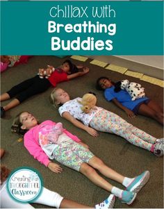 children laying on the floor in a circle with their arms around each other and text reading breathing buddies