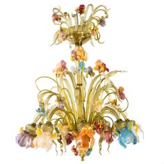 a glass chandelier with many flowers on it