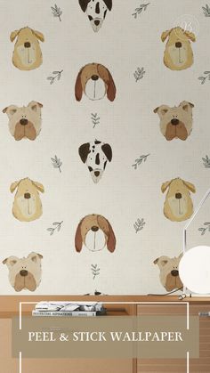 the wallpaper has dogs on it and is next to a desk with a lamp