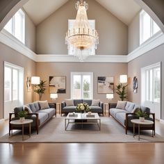 a living room with couches, tables and chandelier hanging from the ceiling