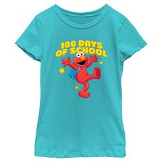 We can tell you how to get to Sesame Street and look good doing it, with these adorable designs for the whole family from the iconic, long-running children's series Sesame Street! Step onto Sesame Street with this officially licensed Girls' Elmo 100 Days of School Graphic T-Shirt featuring Elmo carrying a backpack while jumping for joy and the phrase: "100 Days of School" at the top. Bring joy and laughter to your day with this new Sesame Street apparel! Back To School Blue Pre-shrunk T-shirt, Cute Blue T-shirt For End Of School Year, Blue Pre-shrunk T-shirt For Back To School, Blue T-shirt For Back To School, Blue Crew Neck T-shirt For Back To School, Blue Fun T-shirt For Back To School, Novelty Blue Cotton Tops, Blue Cotton T-shirt For Back To School, Blue Cotton Novelty Top