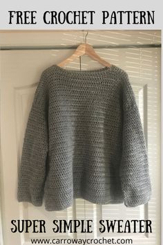 a crocheted sweater hanging on a door with the text, free crochet pattern